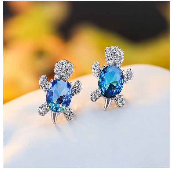 Blue Crystal Turtle Stud Earrings — Silver Tone
